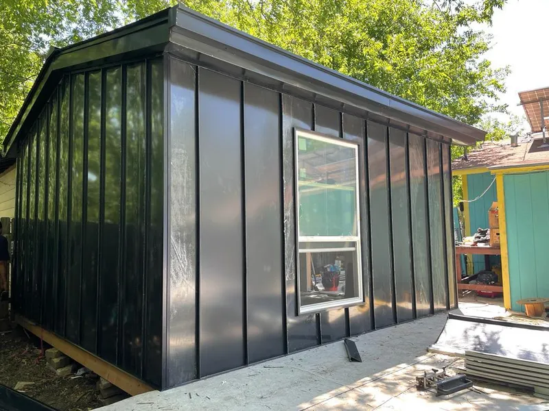 Black standing seam metal wall panels for Roof Inspection in Middleborough